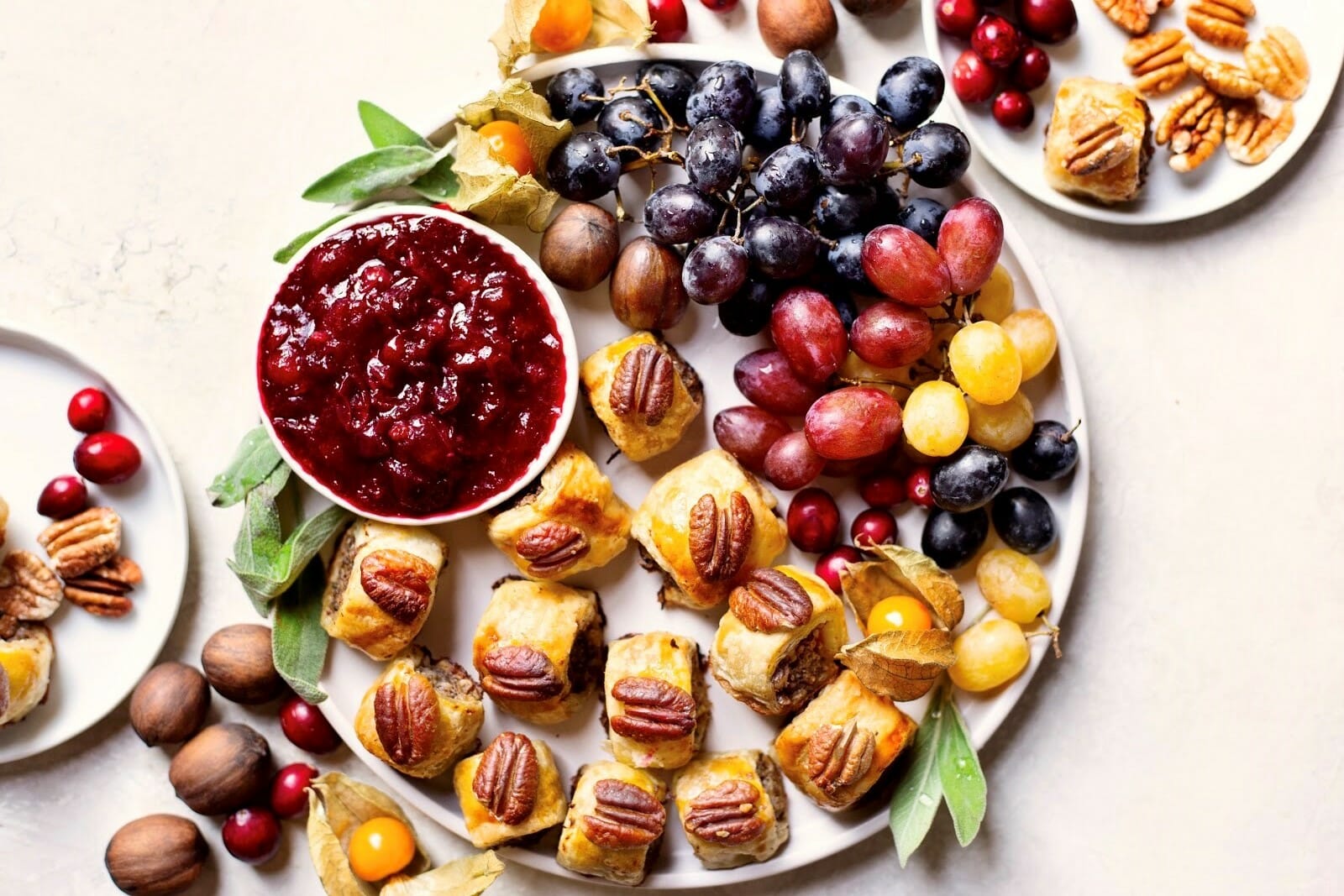 Turkey Sausage Rolls with Pecans and Cranberry Sauce